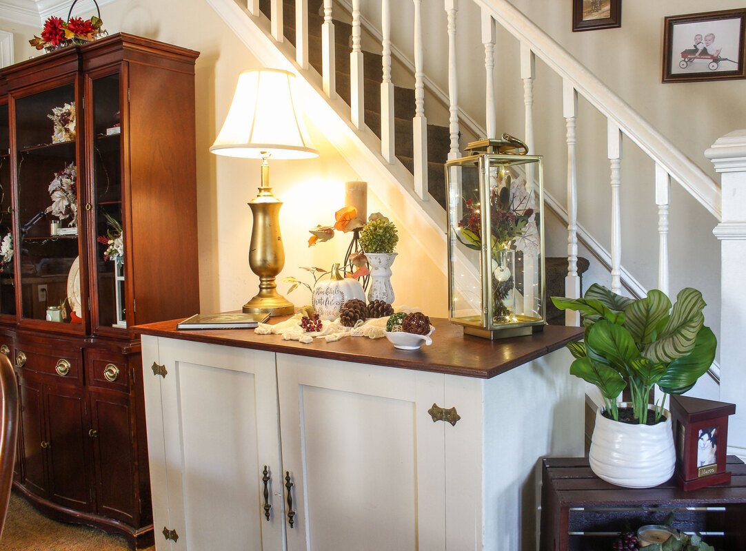 Dining room cabinet refinished and decorated.