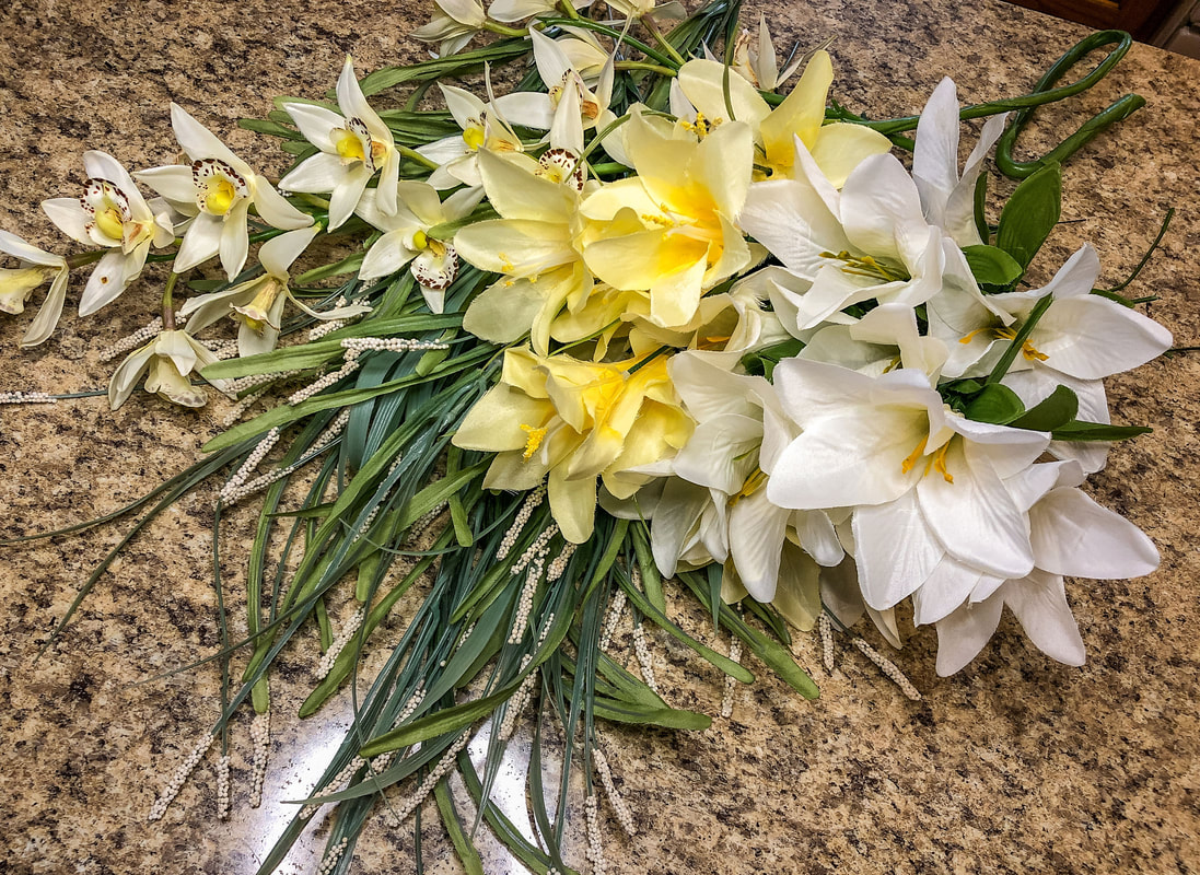 Faux florals used in a spring wreath.