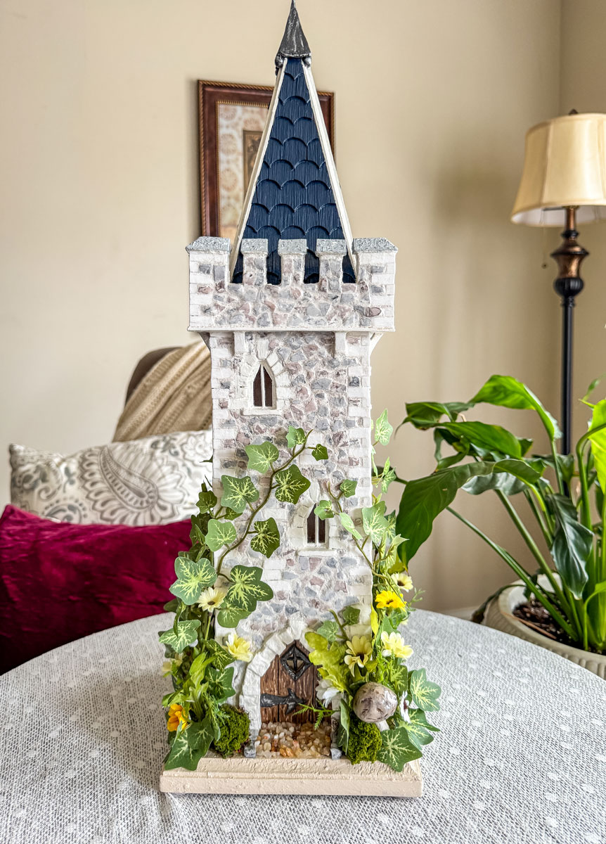 Handcrafted fairy castle tower with faux ivy.