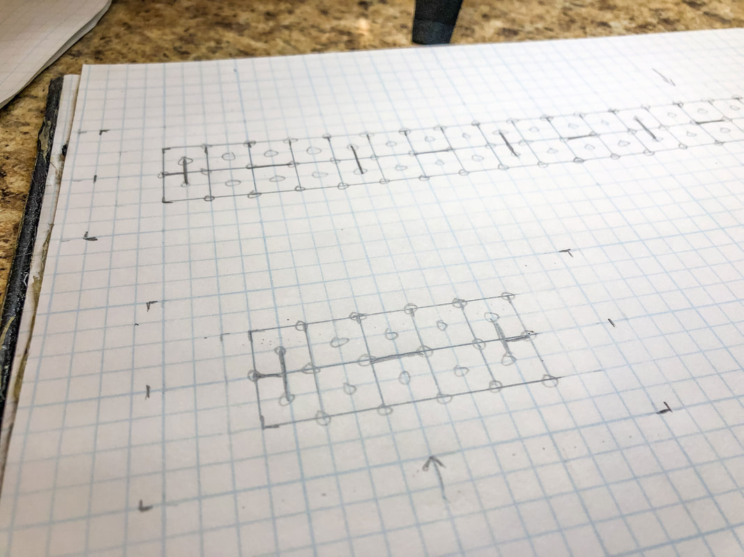 Grid paper with Celtic knot grid and breaks.