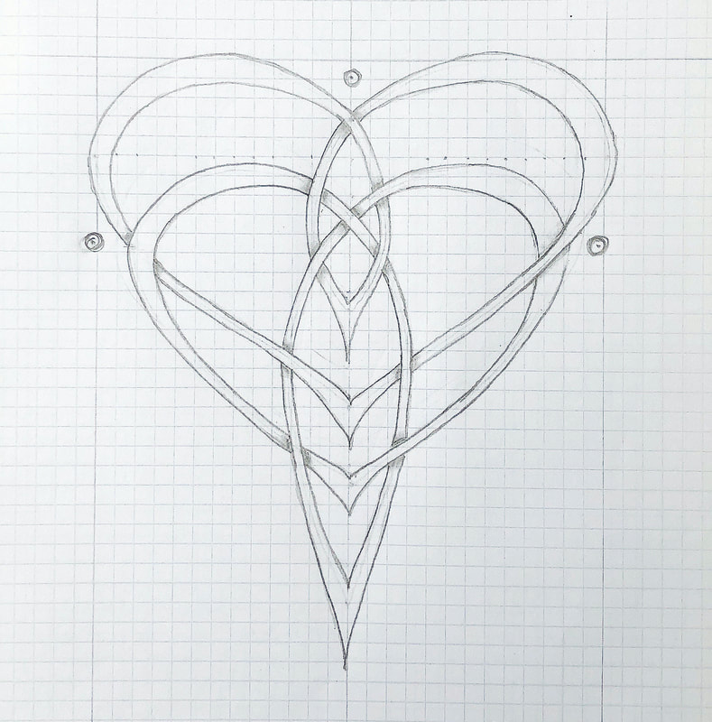 Celtic Motherhood Knot on grid paper.